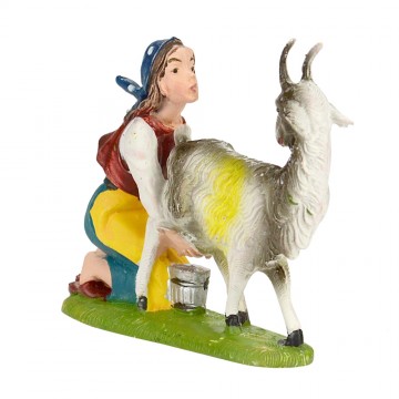 Woman Milking a Goat...