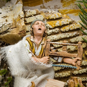 Carpenter with Saw and Plane