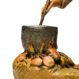 Kneeling Shepherd Cooking