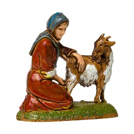 Woman Kneeling Milking a Goat